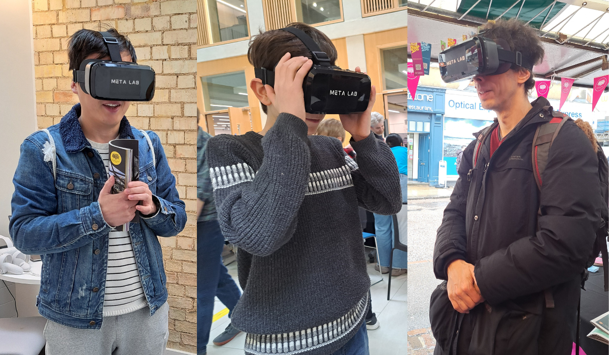 3 people wearing VR head mounts at Cambridge festival