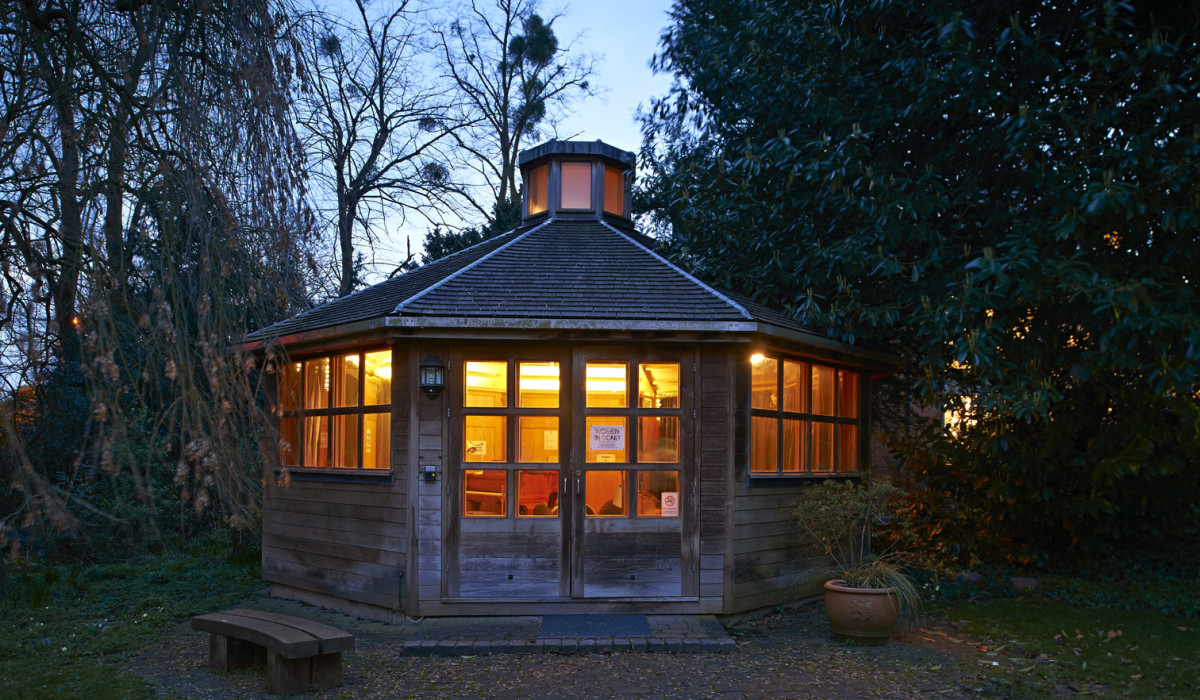 Music Pavillion at dusk with light on