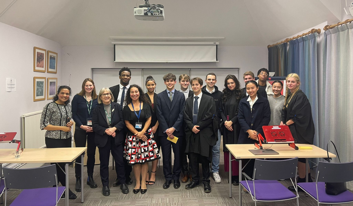 Group image of students and judges at Moot Court competition