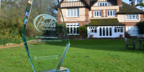 Close up of the glass trophy for the Digital Health Awards, with Strathaird in the background